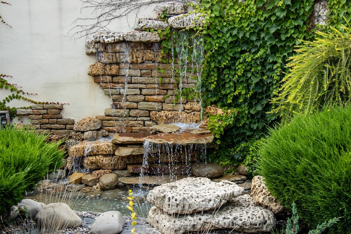 Small Corner Yard Waterfall Pond Idea 8